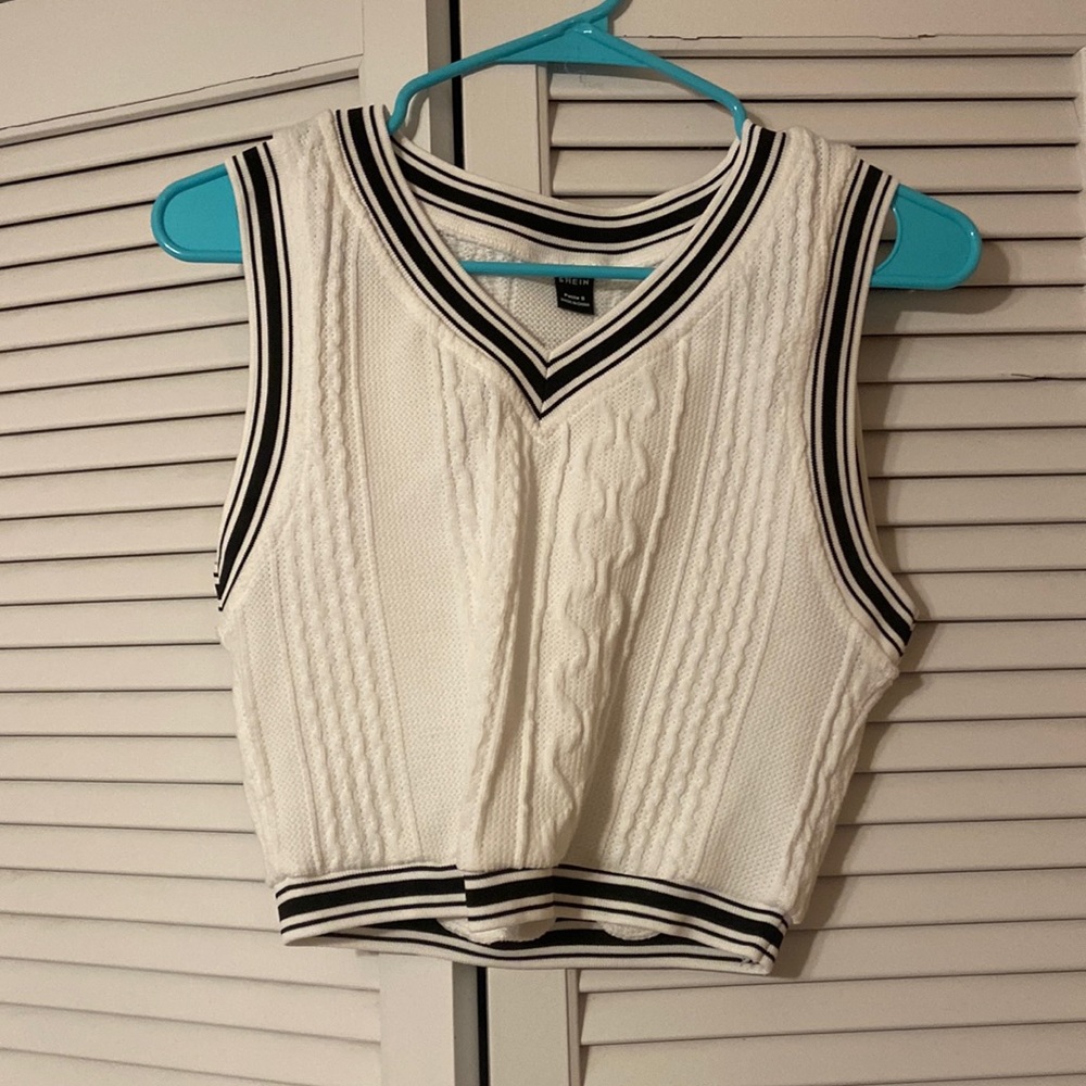 white with black trim sweater vest